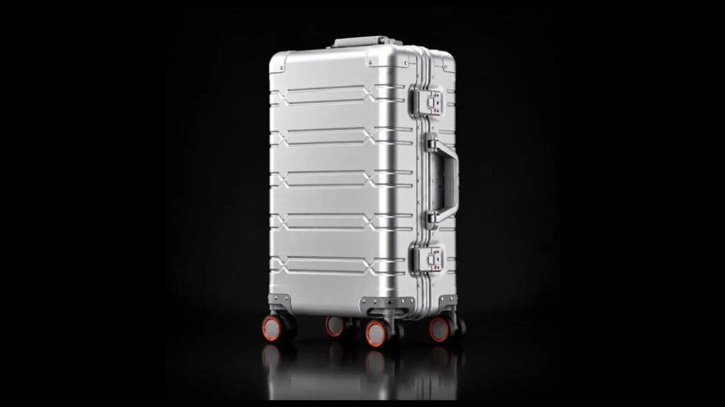 Silver TS-006 aluminum suitcase with the complete shell, handles, locks and wheels visible